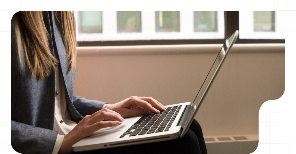 Girl with a laptop searching how-to do a digital onboarding