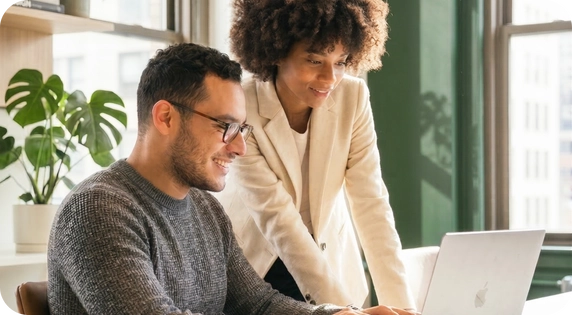 Team reviewing documents in a work meeting